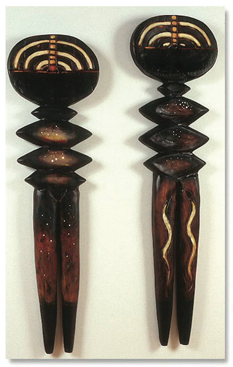 Shamans (set of 2).2004.burnished and painted wood.female-58x16x3in.male-62x17x3in